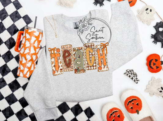 fall teach crewneck